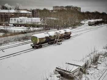 Train on snow covered railroad tracks