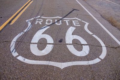 High angle view of sign on street