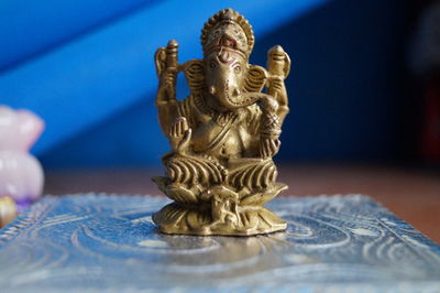Ganesha idol on table