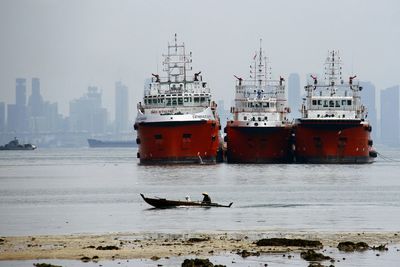 Boats in harbor