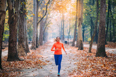 Woman jogging. nature, outdoor park