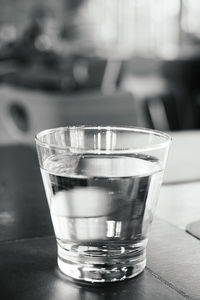 Close-up of water in glass on table