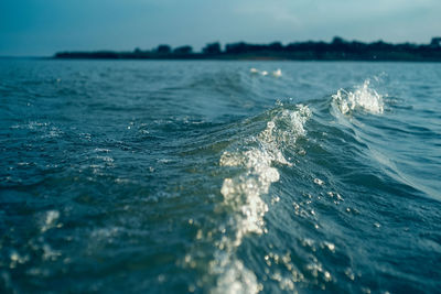 Scenic view of sea against blue sky