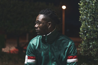 Portrait of young man looking away