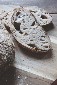 High angle view of bread on cutting board