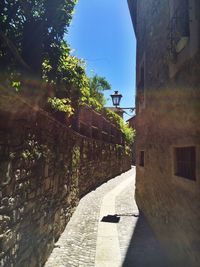 Narrow alley along buildings