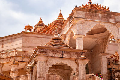 Artistic red stone jain temple at morning from unique angle