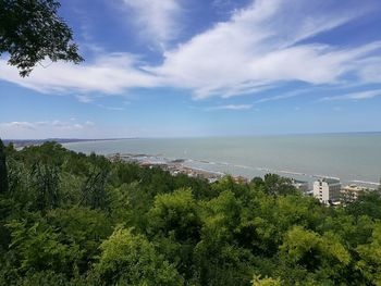 Scenic view of sea against cloudy sky