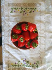 High angle view of strawberries in bowl