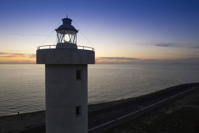 Aerial photographic documentation of a lighthouse taken at sunset