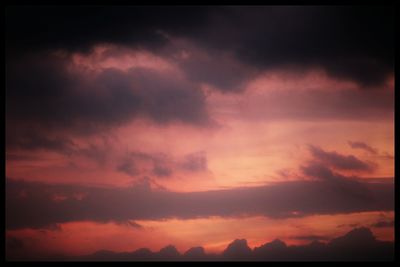 Scenic view of dramatic sky over landscape