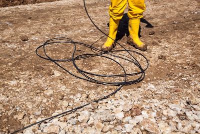 Low section of person standing on ground