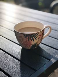 Close-up of coffee cup on table