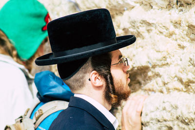 Portrait of young man wearing hat