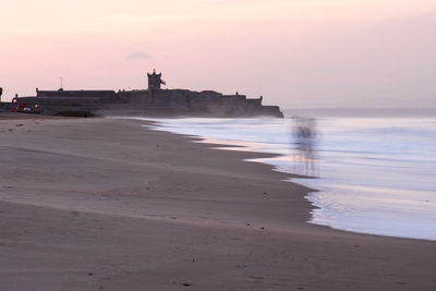 View of beach at sunrise