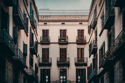Low angle view of residential building against sky