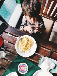 High angle view of man having food