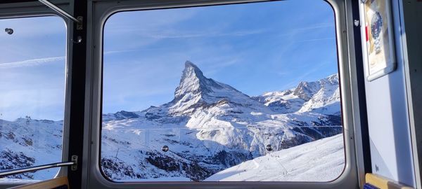 Scenic view of snowcapped mountains