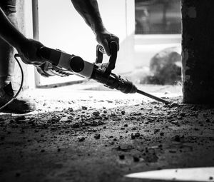 Low section of man working at construction site