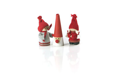 Close-up of figurine against white background