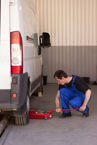 Man cleaning car