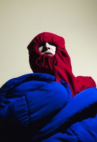 Portrait of woman with red umbrella