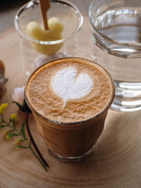 Close-up of cappuccino on table