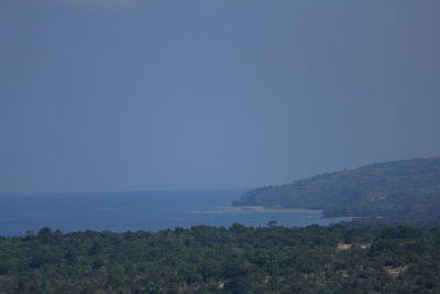 Scenic view of sea against clear blue sky