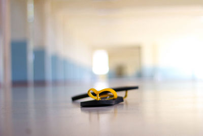 Close-up of yellow candle on table