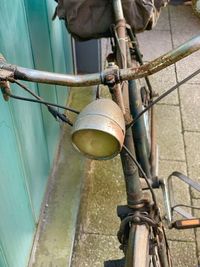 High angle view of old rusty bicycle