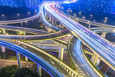 High angle view of light trails on elevated road