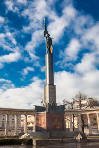 Low angle view of statue against sky
