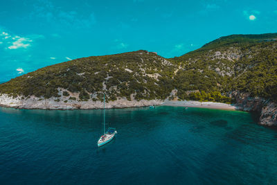 Scenic view of sea against blue sky