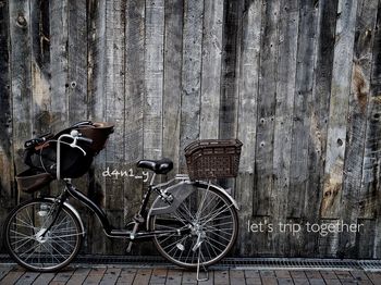 Bicycle parked against wall