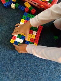 Low section of person holding toy