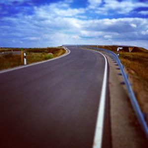 Surface level of empty road along landscape