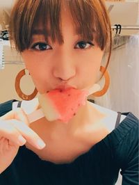 Close-up of woman holding ice cream