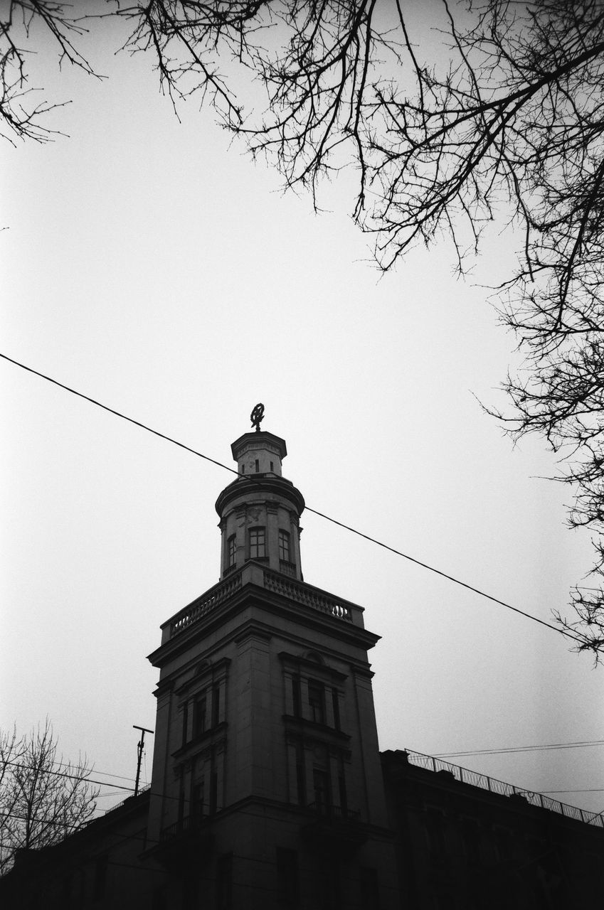 LOW ANGLE VIEW OF TOWER AGAINST THE SKY