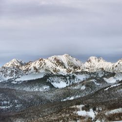 Scenic view of snow covered mountains