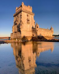 Reflection of building in lake