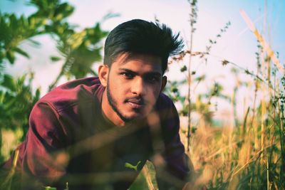 Portrait of young man outdoors