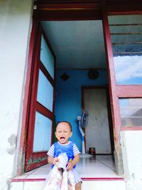 Portrait of cute boy smiling