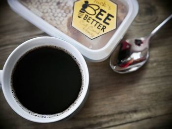 High angle view of coffee cup on table