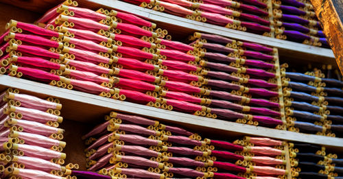 Full frame shot of multi colored shelf at market stall