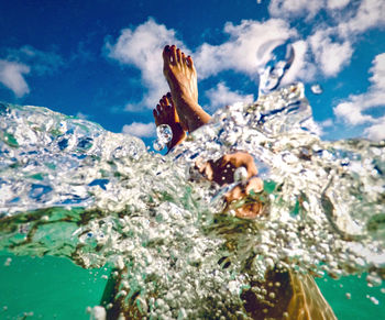 Man swimming in sea