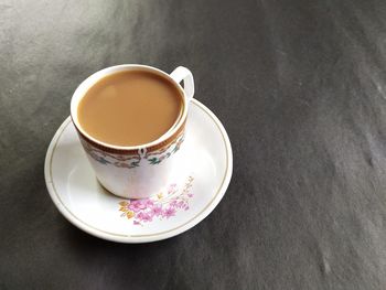 High angle view of coffee on table