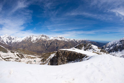 Scenic view of snow covered mountains