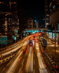 Light trails on city street at night