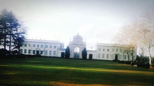 Facade of building against sky