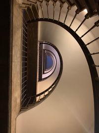 Directly below shot of spiral staircase of building